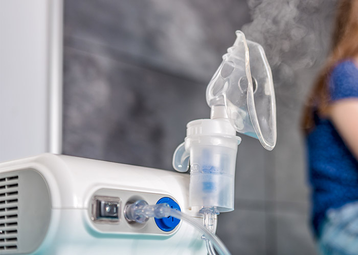 Photo featuring a nebulizer in action.